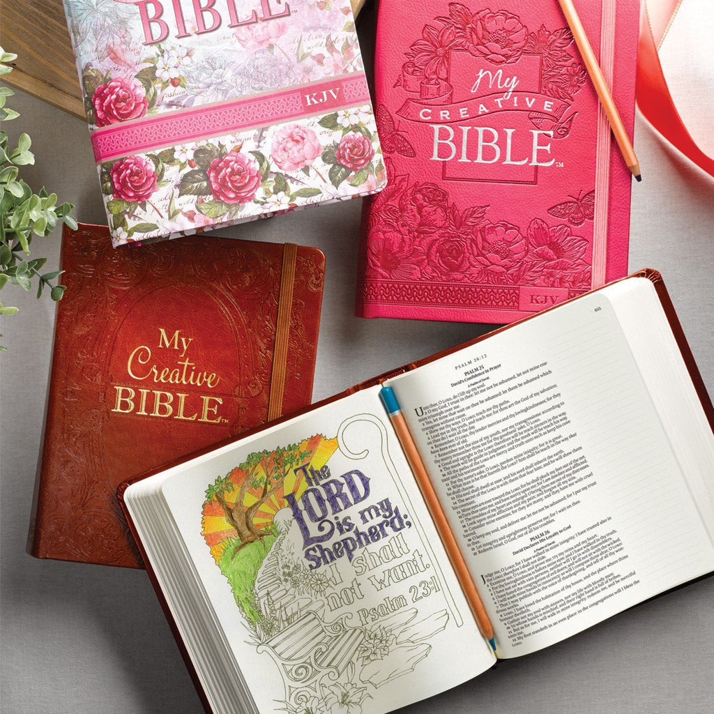 https://adventacle.myshopify.com/cdn/shop/products/coloring-bibles-for-illustrated-faith-journaling-my-creative-bible-bible-journal-pink-aqua-brown-or-floral-cover-kjv-coloring-bible-736651_1024x1024.jpg?v=1584919441